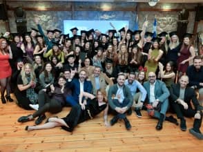 Students and instructors at a graduation ceremony
