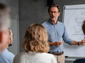 A man presents his digital marketing strategy to the team