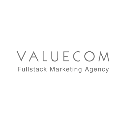 Valuecom marketing greyscale logo.